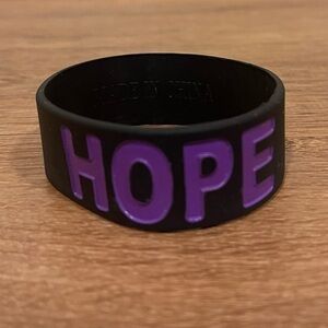 Black and purple hope thick silicone/rubber bracelet​​​​​​